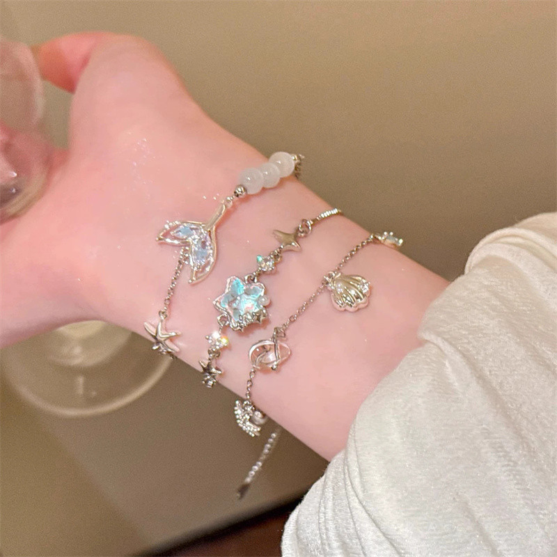 สร้อยข้อมือแฮนด์เมดคริสตัลเชลล์ปลาน้ำเงินสำหรับสุภาพสตรี