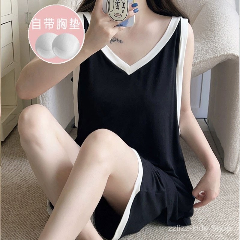 ชุดนอนสุภาพสตรีกับแผ่นหน้าอกสลิงชุดนอนผู้หญิงฤดูร้อนสไตล์ใหม่เสื้อกั๊กแขนกุดสีทึบกางเกงขาสั้นสูทหลวมสบายๆ ชุดบ้าน