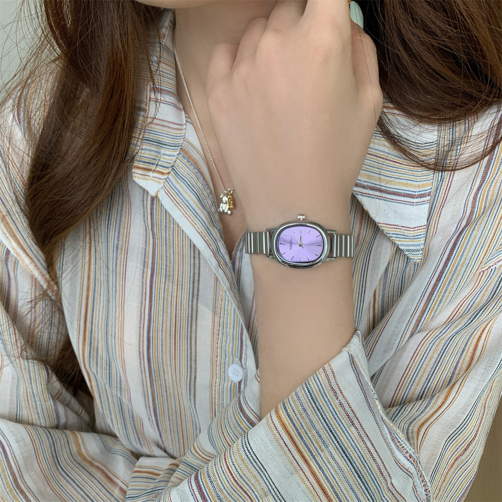 นาฬิการูปไข่สีม่วงผู้หญิง ins นาฬิกาแฟชั่นผู้หญิงวงเหล็กที่สวยงาม