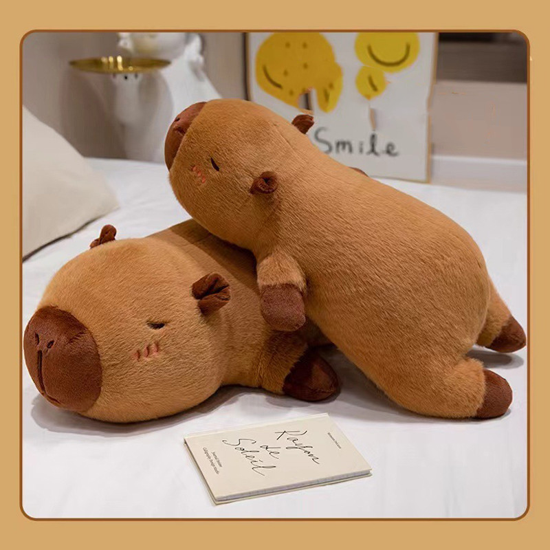 พร้อมส่ง Capybara ตุ๊กตาคาปิบาร่า นุ่มและน่ารัก หมอนอิงหมอนยาว เหมาะกับของขวัญวันเกิด 50/70/90ซม ราคา ถูกที่สุด ดีลบีเคเค แกลเลอรีภาพที่ 9