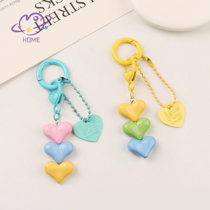 [mayhome] แฟชั่นที่มีสีสันหัวใจลูกปัดพวงกุญแจสําหรับผู้หญิงสาวหูฟังกรณีจี้กระเป๋าอุปกรณ์ตกแต่ง DIY พวงกุญแจของขวัญ {TH}