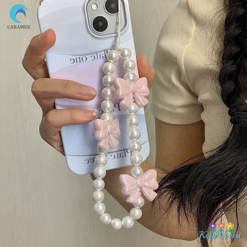 เก็บย้าย โบว์มุกสีชมพูโทรศัพท์โซ่สร้อยข้อมือป้องกันการสูญหายสําหรับกรณีโทรศัพท์มือถือสายรัดข้อมือ ซีซีดี เชือกเส้นเล็กโทรศัพท์พวงกุญแจแบบพกพาโซ่ใ