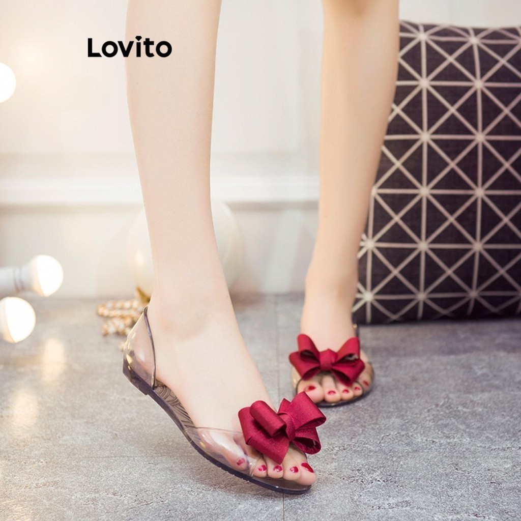 Lovito รองเท้าผู้หญิง ส้นเตี้ย แต่งโบว์ สีเรียบ สไตล์ลำลอง LFA28043