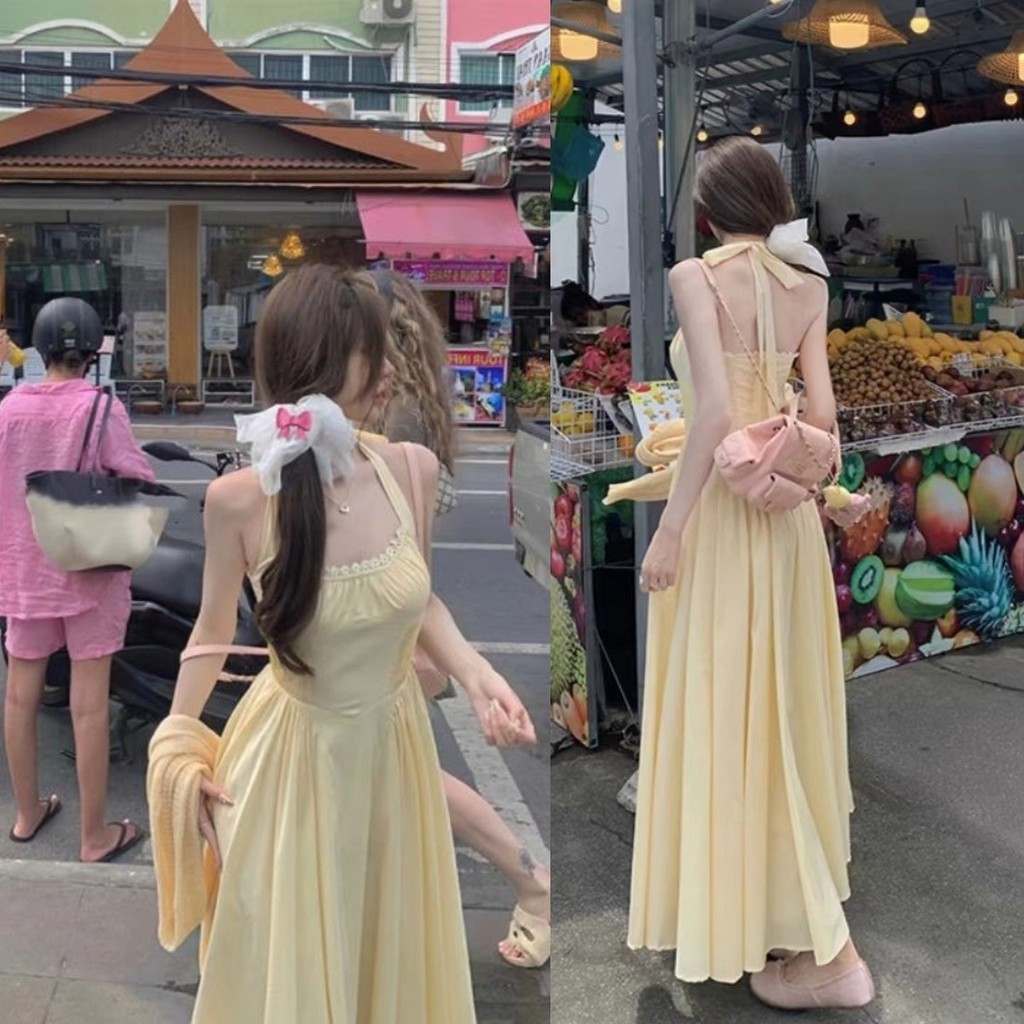 ชุดเดรส ผู้หญิงสลิงฝรั่งเศสอ่อนโยนสีเหลืองริมทะเลวันหยุดอารมณ์ใหม่เอวยาวบาง