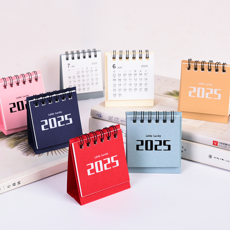 2025 มินิโต๊ะปฏิทินกระชับออกแบบมินิปฏิทินแบบพกพาขดลวดปฏิทินพับวางแผนกระเป๋าปฏิทินสําหรับโรงเรียนสํานักงาน