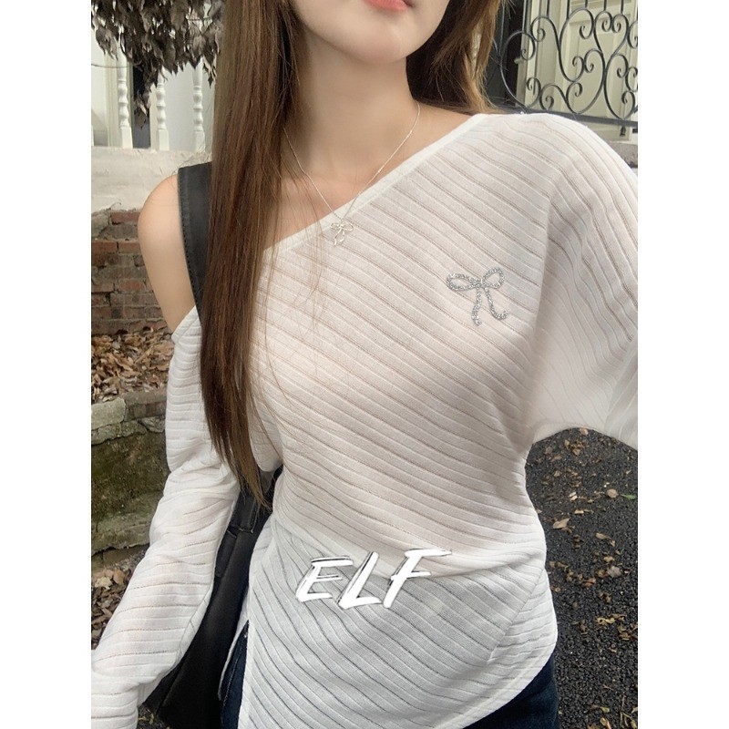 ELFwoo เสื้อยืดถักแขนยาวแบบเอียงสําหรับผู้หญิงในฤดูใบไม้ร่วงรูปเงากว้างป้องกันแสงแดดเสื้อเปิดไหล่ไม่