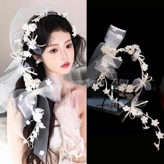 ผ้าโพกศีรษะเจ้าสาวยาวหรูหรา สไตล์ดอกไม้สีขาวพร้อมโบว์และตาข่…