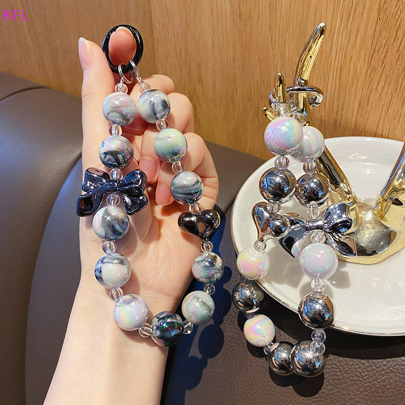 (KFL) Creative Love Beaded Key จี้โบว์ปมโทรศัพท์มือถือแขวนโซ่หูฟัง DIY เครื่องประดับจี้กระเป๋าเป้สะพายหลังตกแต่งขายร้อน