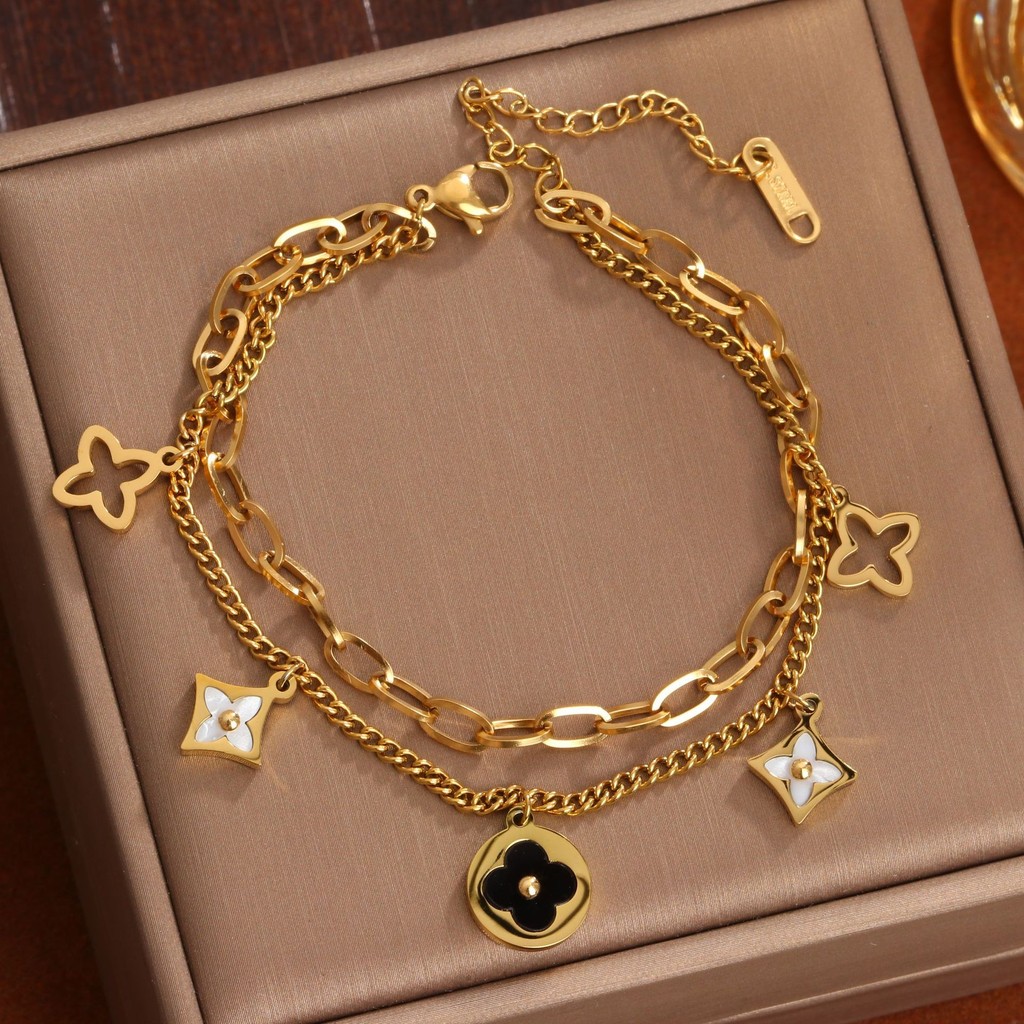 หรูหรา High-End Four-Leaf Clover สร้อยข้อมือหญิงอินเทรนด์ญี่ปุ่นเกาหลี Double-Layer Design สีขาวแม่ @-