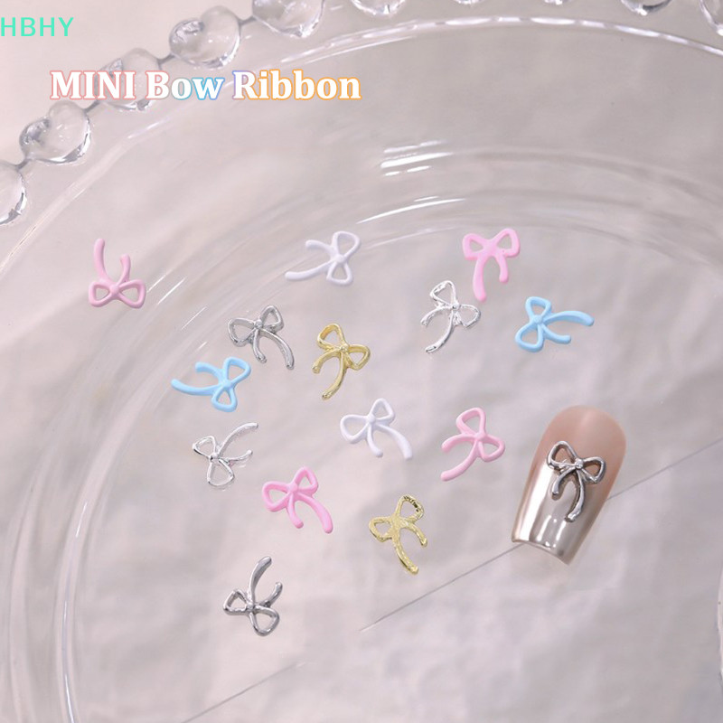 HB 10 ชิ้นเกาหลี Kawaii โบว์ริบบิ้นเล็บ Sh โลหะน่ารักสีสัน Bowknot ริบบิ้นตกแต่งเล็บ HY