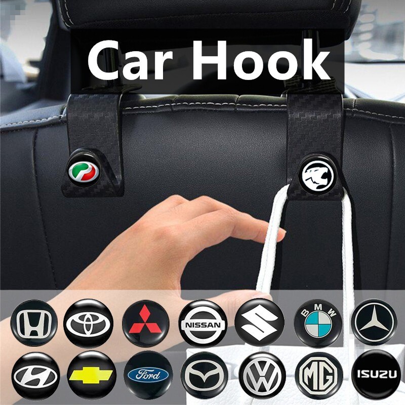 1 ชิ้น Universal คาร์บอนไฟเบอร์รถ Headrest แขวนตะขอมัลติฟังก์ชั่ที่นั่งกลับที่วางโทรศัพท์กระเป๋าถือกระเป๋าแขวน Fastener คลิปภายใน Aksesori Kereta สําหรับ Honda Toyota Nissan