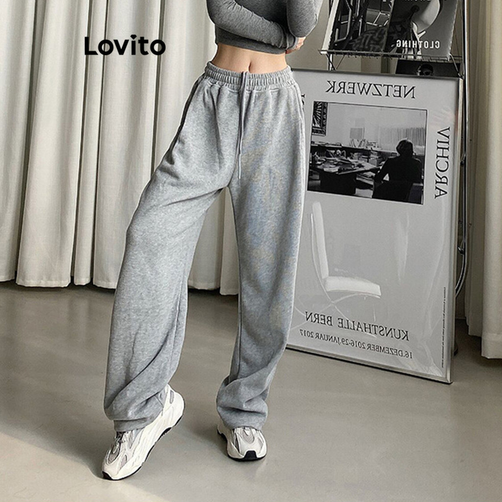 Lovito กางเกงผู้หญิง มีกระเป๋า แบบเชือกรูด สีพื้น สไตล์ลำลอง LNL54038
