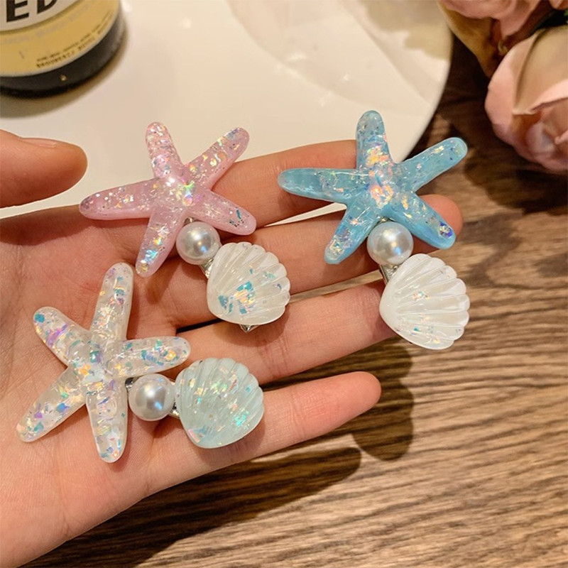 ของประดับผมลายเปลือกหอยดาวทะเล ออกแบบคลิปลายพองามๆ สำหรับวันหยุดในสไตล์น่ารัก