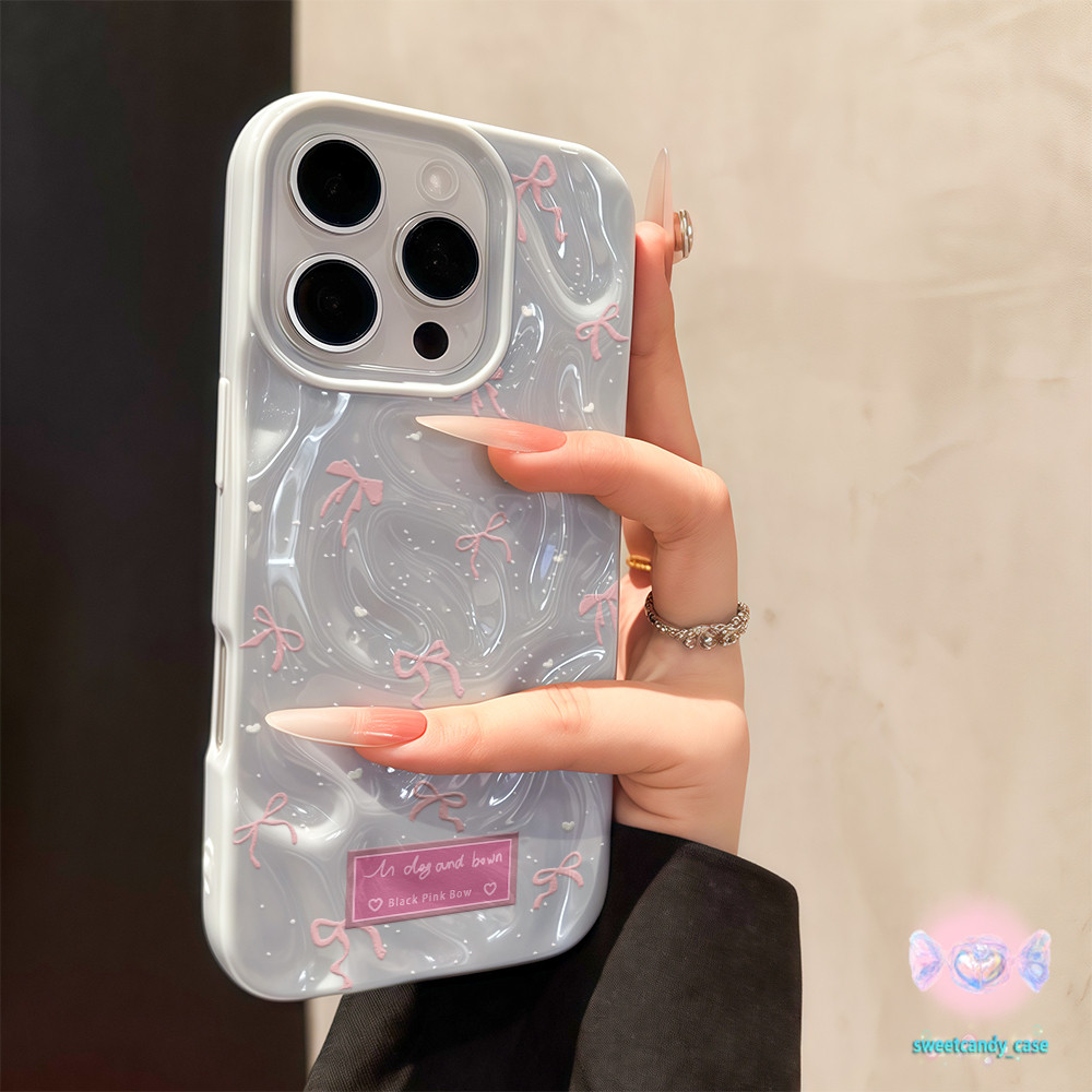 💖จัดส่งในพื้นที่💖 เคสเหมือนอุกกาบาต ธนูสีชมพู เกล็ดหิมะสีขาว สําหรับIPhone16 15 14 13 12 11 7 8 plus Pro Promax X XR XS