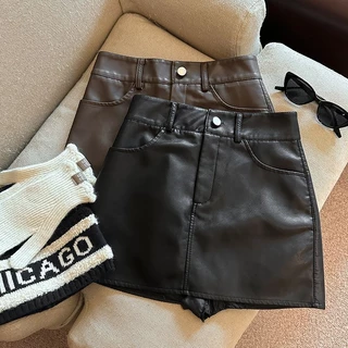 ฤดูใบไม้ร่วงฤดูหนาว PU หนัง A-line กระโปรงผู้หญิงเอวสูง Slim Fit สะโพกกอดกระโปรงสั้นขนาดใหญ่ S-4XL
