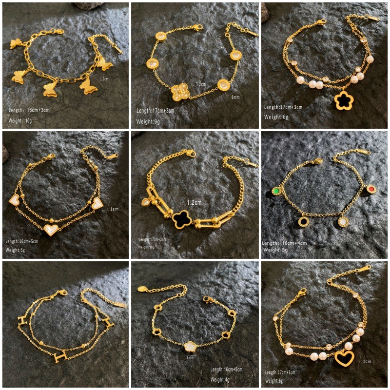 เวอร์ชั่นเกาหลีของแฟชั่นสร้อยข้อมือระดับไฮเอนด์ที่เรียบง่ายทองโคลเวอร์สี่ใบตัวเลขโรมันสร้อยข้อมือสองชั้นเหล็กไทเทเนียมชุบสร้อยข้อมือทองแท้อุป