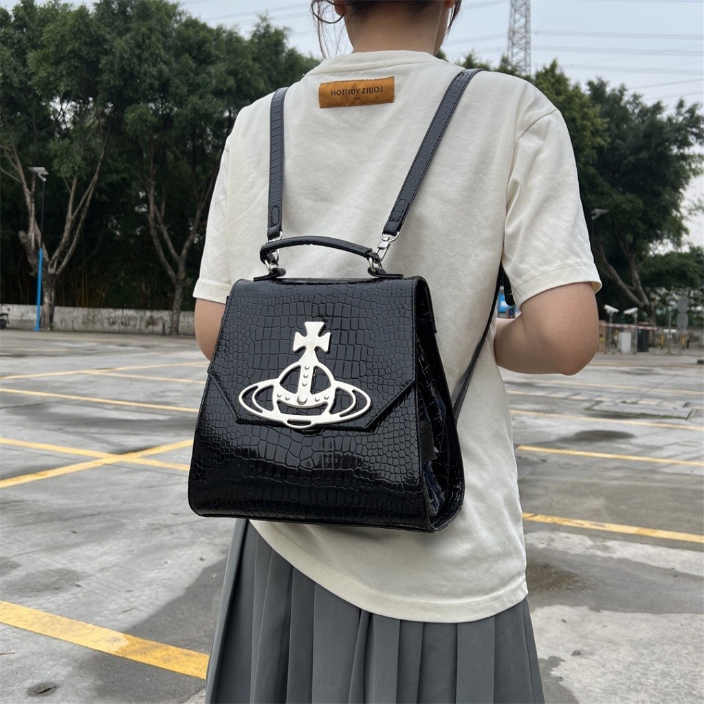 กระเป๋าหญิงกระเป๋าเป้สะพายหลังสไตล์ใหม่ลายจระเข้ดาวเสาร์ราชินีแม่เวสกระเป๋าเป้สะพายหลังความจุขนาดใหญ่กระเป๋านักเรียน ถึง999999-0627