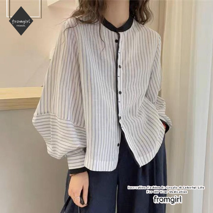 เสื้อลายแนวตั้งแขนยาวสำหรับผู้หญิง ออกแบบตามเทรนด์ล่าสุด
