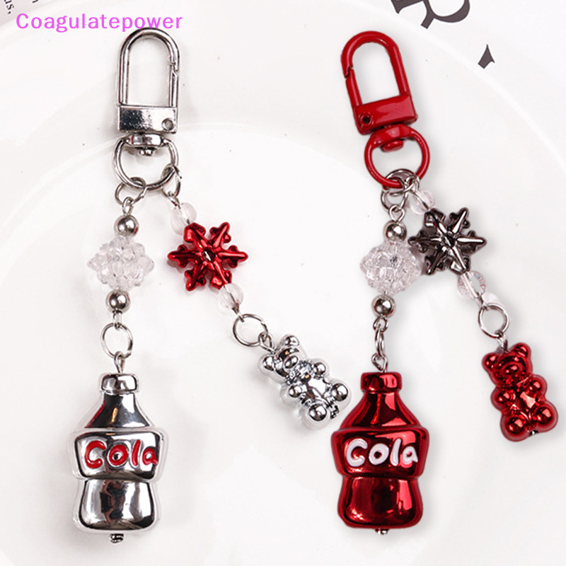 Coa การ์ตูน Cola ขวดพวงกุญแจจี้ Coke Bear Snowflake พวงกุญแจโทรศัพท์มือถือกระเป๋าเป้สะพายหลัง Ch กระ