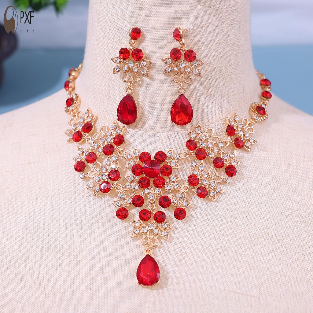 ผู้หญิงเงาเพชรสร้อยคอต่างหูชุดประกายที่มีสีสัน พลอยเทียม เครื่องประดับชุด