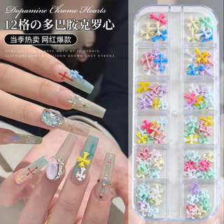 12-Grid สีสัน Cross Star สาวร้อนที่ไม่ซ้ํากันหวานเย็นสไตล์อุปกรณ์แต่งเล็บ Dopamine ผสมขนาดใหญ่ขนาดเล็กสามมิติ DIY ตกแต่งเล็บ