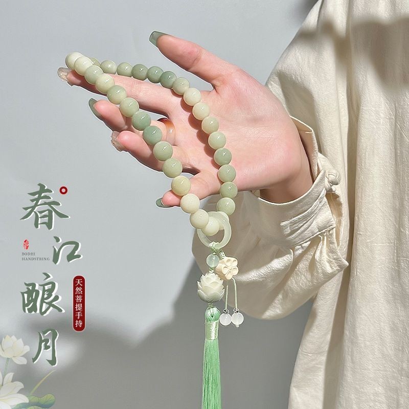 12มิลลิเมตรมือถือโพธิ์มือสตริงโลตัสสร้อยข้อมือไล่โทนสีสีลูกปัดพระพุทธรูปลูกปัดสไตล์ผู้หญิง