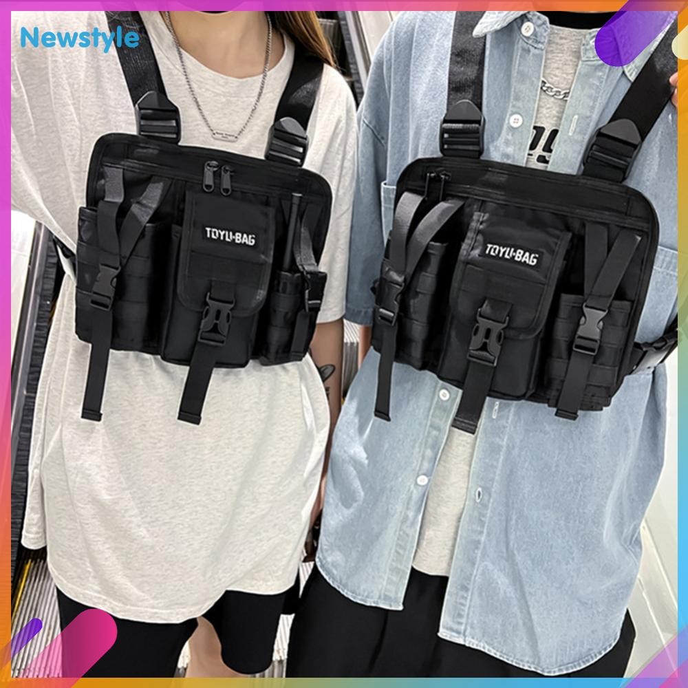 สไตล์ใหม่ Unisex Chest Pack แฟชั่นยุทธวิธีกระเป๋าคาดหน้าอก Hip Hop เสื้อกั๊กกระเป๋าคาดเอวผู้หญิงผู้ชายผ้าใบ Chest Rig กระเป๋าสะพาย