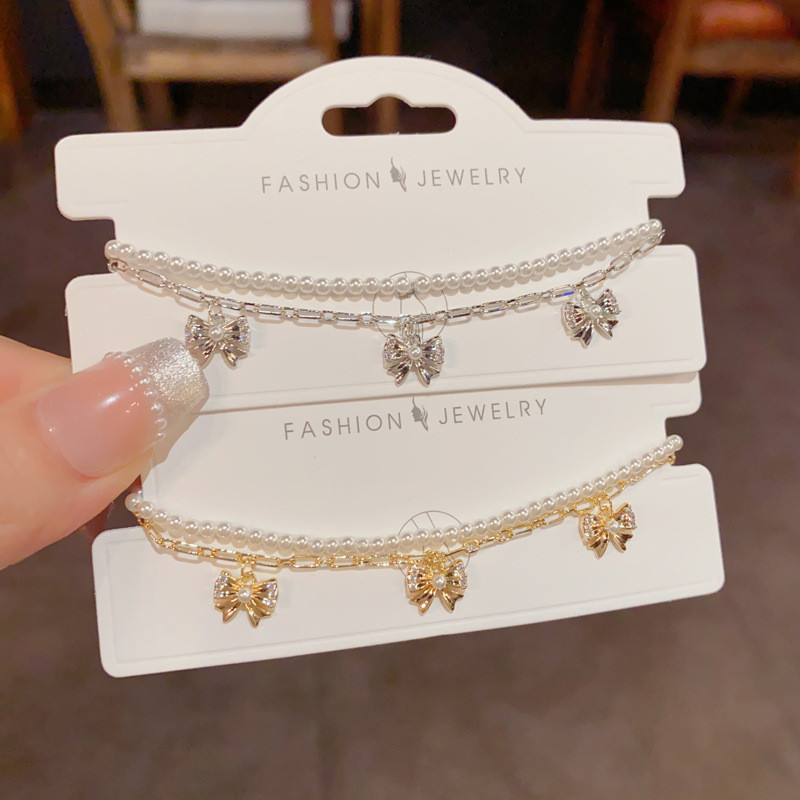 สร้อยข้อมือโซ่สองชั้นมุกโบว์ ดีไซน์สไตล์ฝรั่งเศส หรูหรา มีสไตล์