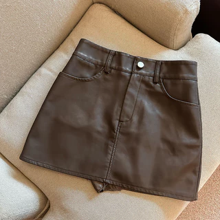 ฤดูใบไม้ร่วงฤดูหนาว PU หนัง A-line กระโปรงผู้หญิงเอวสูง Slim Fit สะโพกกอดกระโปรงสั้นขนาดใหญ่ S-4XL