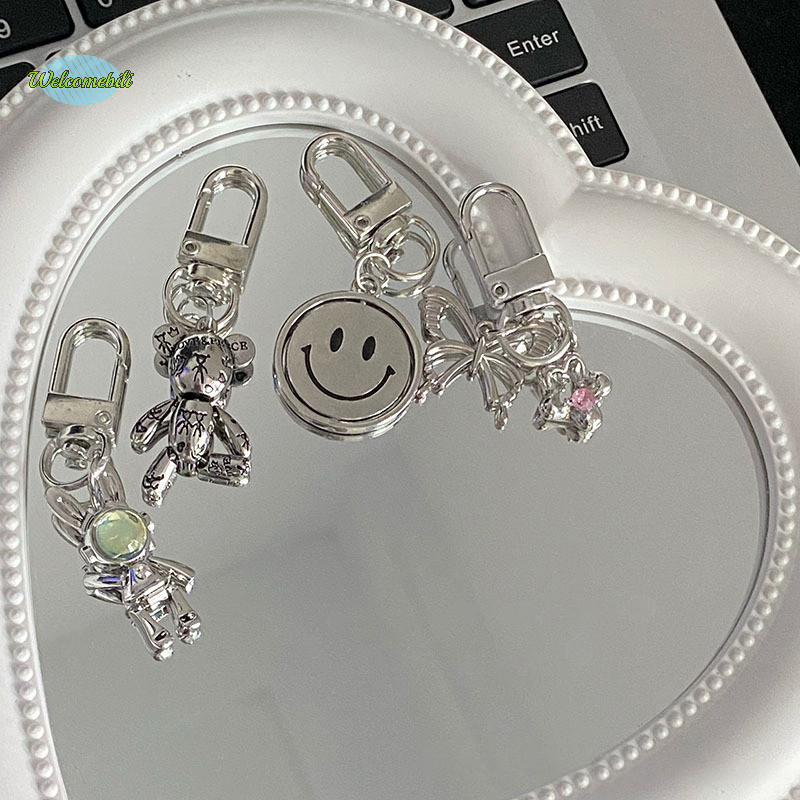 [ยินดีต้อนรับ] บุคลิกภาพ Cool Crowe Heart Cross Key Chain Creative Revolving Smiley Face กระเป๋าจี้สําหรับคนรักของขวัญใหม่