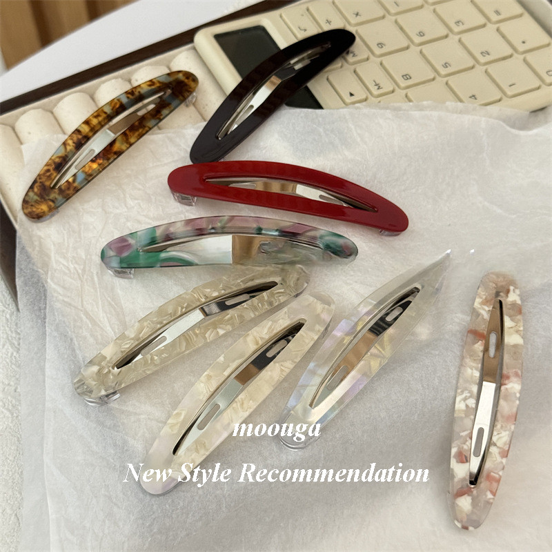 Mouga/temperament ด้านข้าง High-End Acetate Breaking Bangs แฟชั่น Hollow รูปไข่ BB