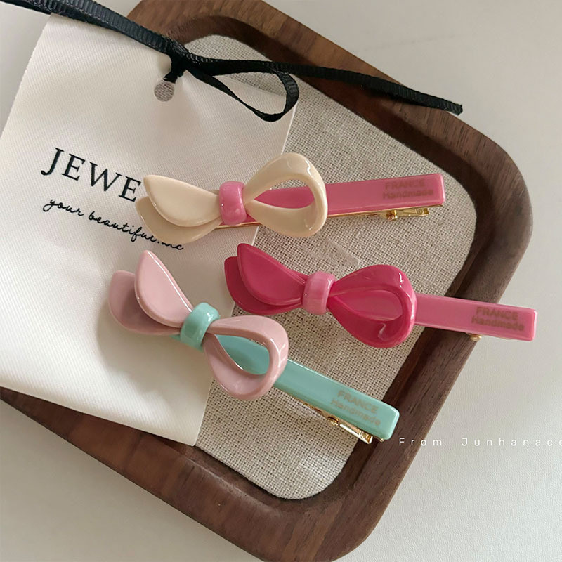 กิ๊บติดผมโบว์กรดอะซิติกสีสันสดใสคลิปปากเป็ดหน้าม้าสีชมพู