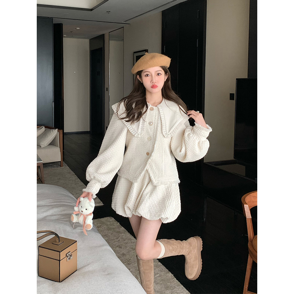 กระโปรงสั้นขอบดิบแบบใหม่เสื้อสองชิ้นคอปกสีกรมท่าชุดออกแบบแขนยาวผู้หญิงเอวสูงคลุมเนื้อฤดูใบไม้ร่วง9bv