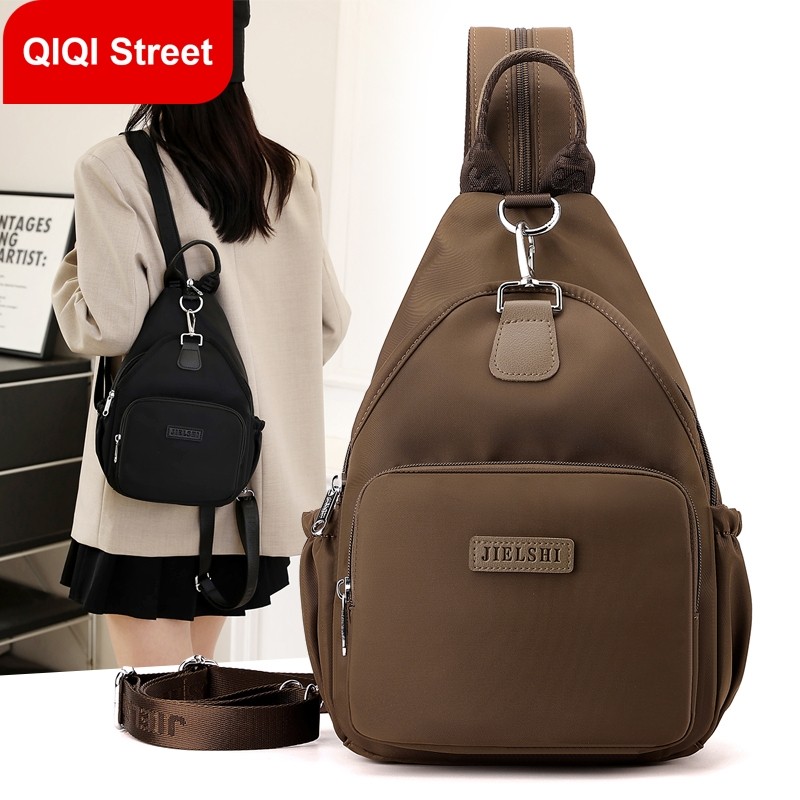 กระเป๋าเป้สะพายหลังผ้า อ็อกซ์ฟอร์ด สําหรับผู้หญิง 2025 ใหม่แฟชั่นอเนกประสงค์อารมณ์กระเป๋าสะพายไหล่เดินทางสบาย ๆ แม่ ถุง