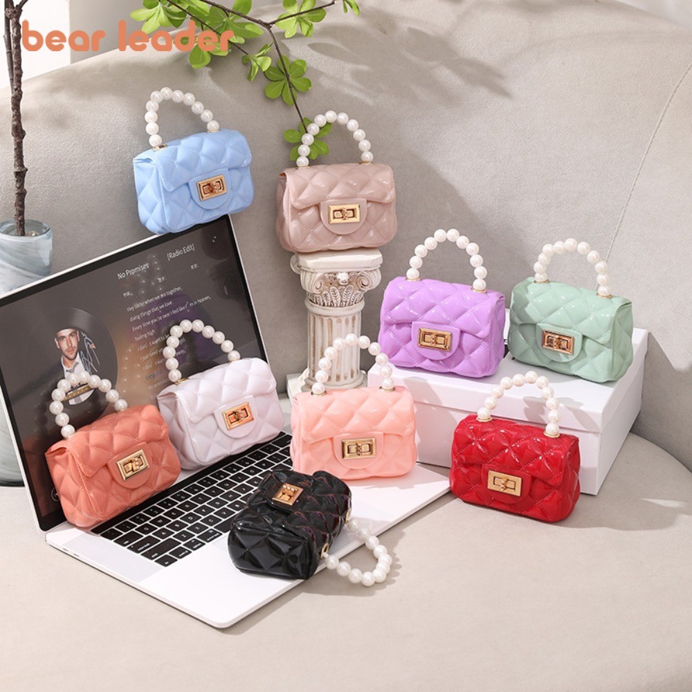 หมีผู้นําใหม่ที่สง่างามเด็กสาวมุกมือถือกระเป๋ามินิแฟชั่นสีทึบเด็กอุปกรณ์เสริมกระเป๋าสะพายกระเป๋าถือคริสต์มาสปีใหม่