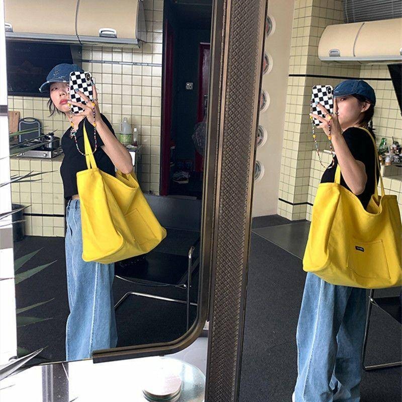 รุ่นเกาหลี ins ความจุขนาดใหญ่ไหล่เดียวกระเป๋าถือถุงผ้าใบสไตล์ขี้เกียจนักเรียนกระเป๋าผู้หญิงที่เรียบง่ายร้อยชุด