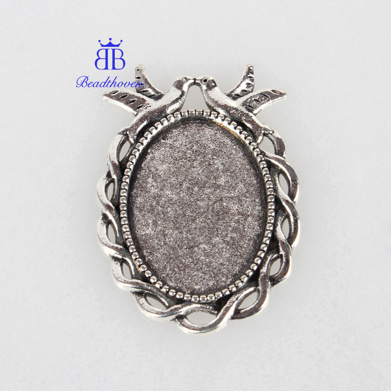 10 ชิ้นทิเบตสไตล์จี้โลหะผสม Cabochon การตั้งค่า Cadmium ฟรีและตะกั่วฟรีรูปไข่กับนกถาดเงินโบราณ: 18x25 มม.38x27x2 มม.รู: 3x4 มม.