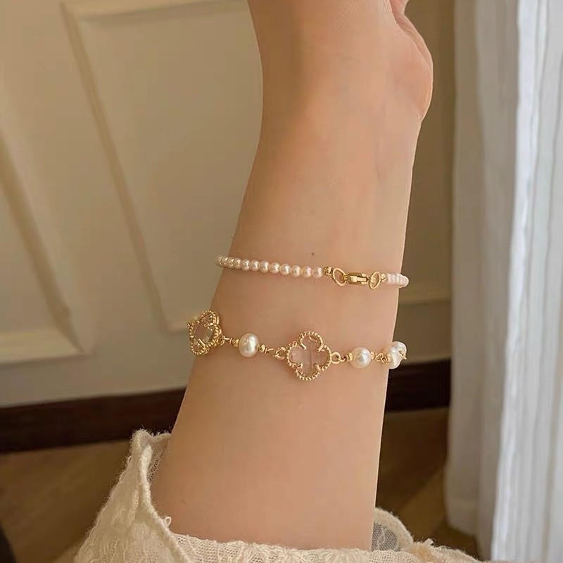 สร้อยข้อมือมุกสาวแสงหรูหราซอกการออกแบบระดับไฮเอนด์ความรู้สึกแฟนนักเรียนสร้อยข้อมือย้อนยุคลูกปัดสไตล์จีน