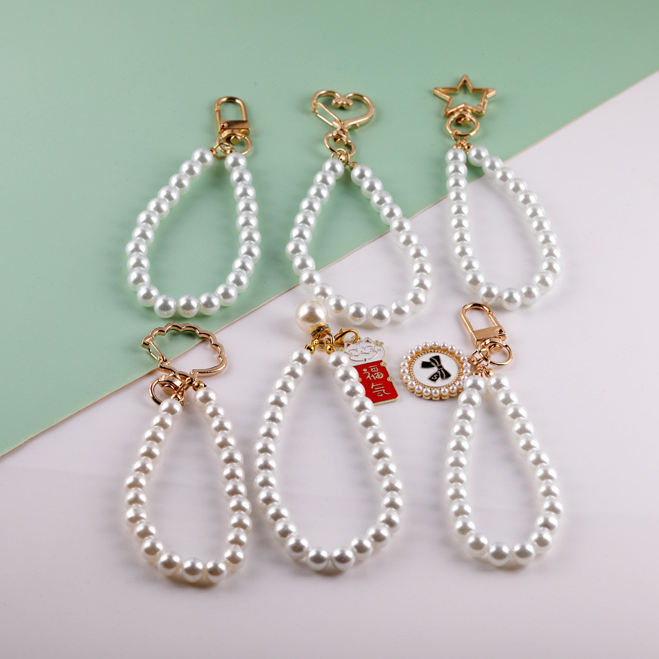 ไข่มุกกระเป๋าโซ่สั้นมุกโซ่อุปกรณ์เสริมลูกผมเคสโทรศัพท์พวงกุญแจจี้