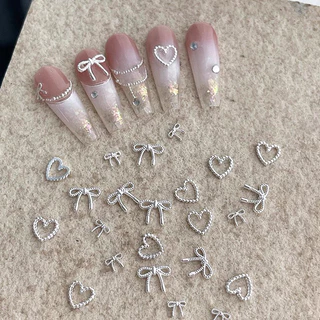 10pcs โลหะผสม Bowknot Love เล็บ Art Charms ตกแต่ง 3D โลหะหรูหรา Silver Bows รูป Jewellery DIY เล็บออกแบบอุปกรณ์