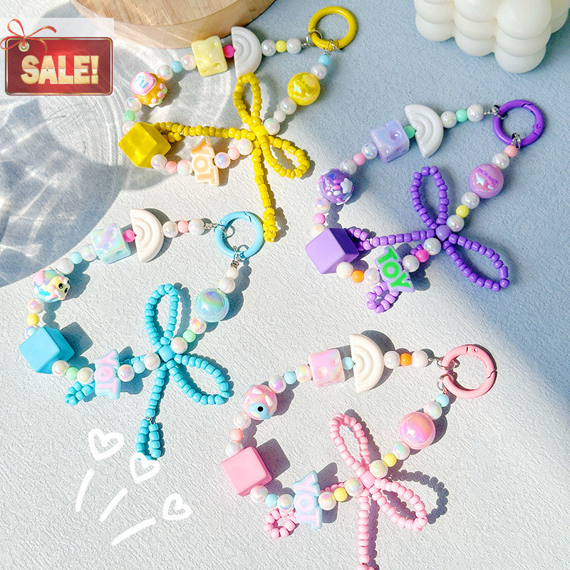 Bl Creative New Bow Hand-ed ลูกปัดโทรศัพท์มือถือแขวนเครื่องประดับกระเป๋าเป้สะพายหลังตกแต่งหูฟัง DIY จี้ A