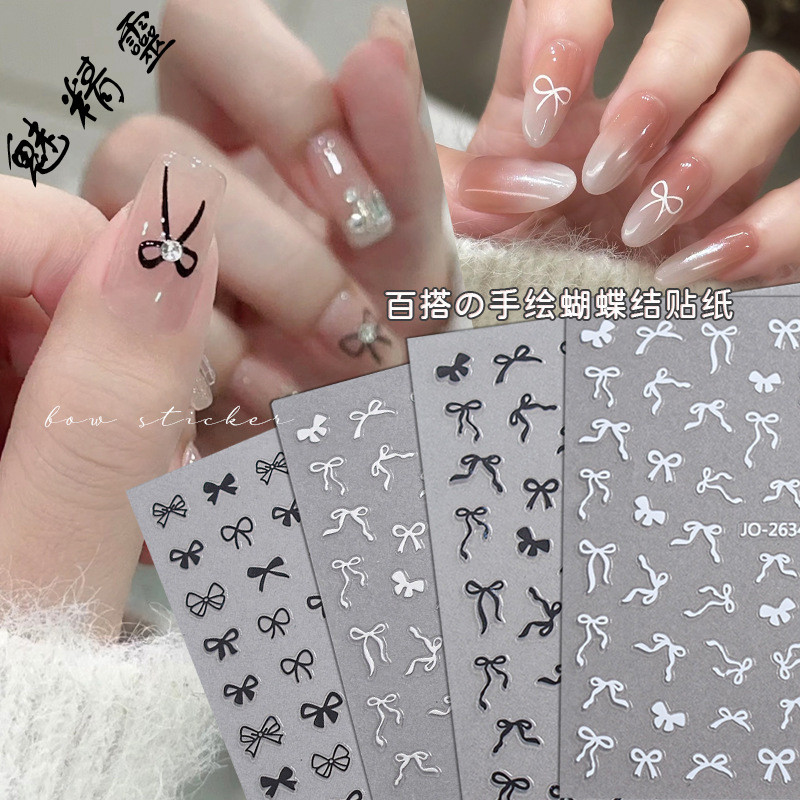 มือวาดโบว์เล็บสติ๊กเกอร์สีดําสีขาวทองเงินริบบิ้นโบว์สวมใส่เล็บสติ๊กเกอร์