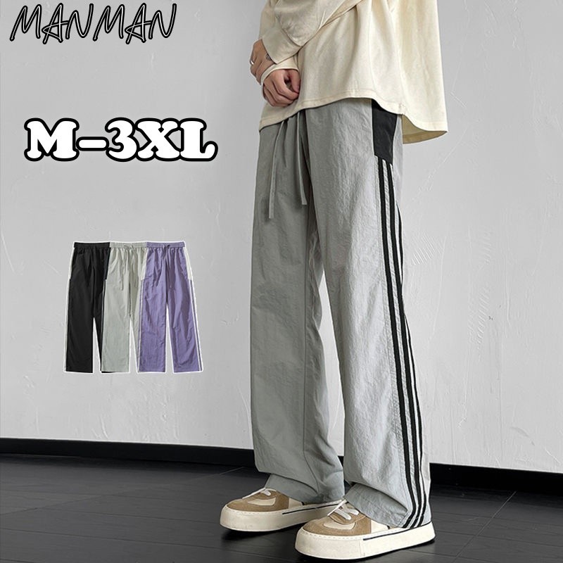 MANMAN กางเกงขายาวผู้ชาย สามแถบ รุ่นทรงกระบอกตรง แบบหลวม แห้งเร็ว ขากว้าง แมทช์ลุคง่าย สไตล์อเมริกัน