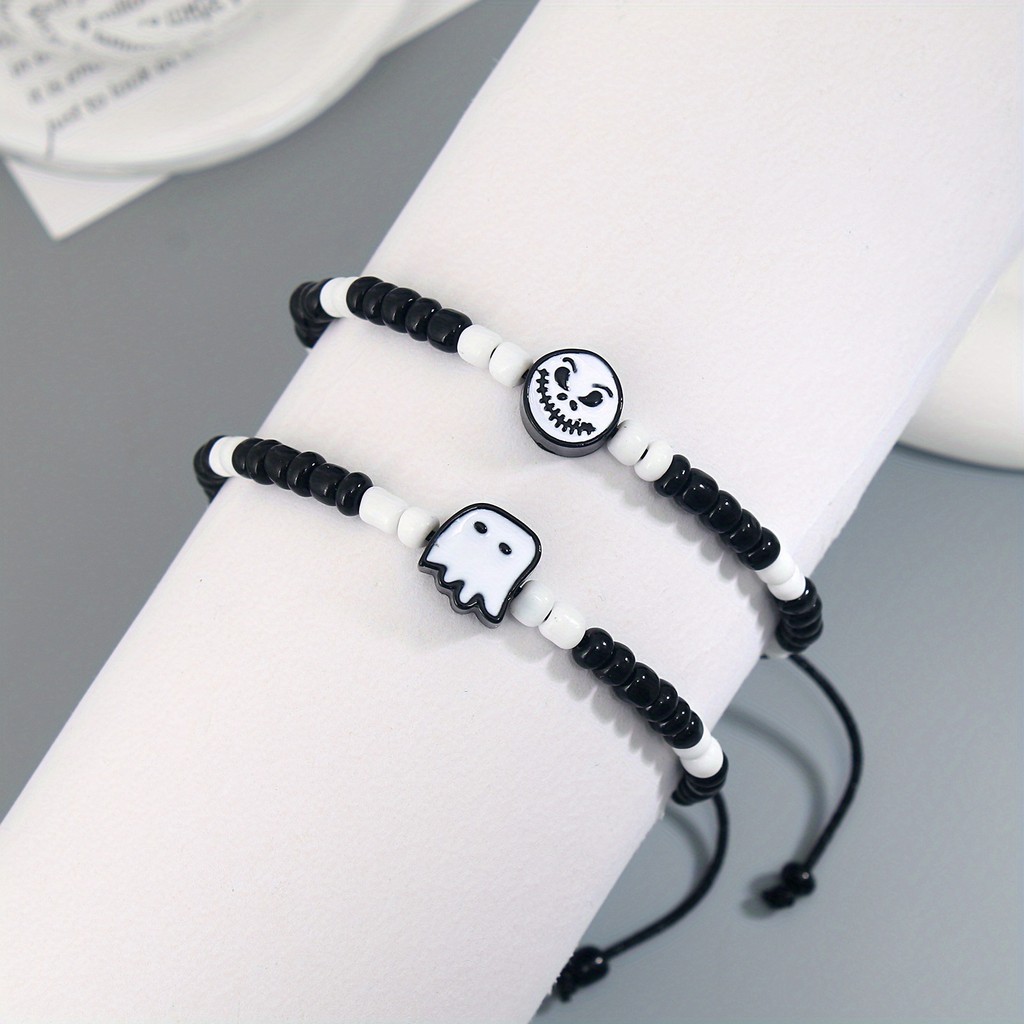Ghost Face สีดําและสีขาวฮาโลวีนใหม่ข้าวลูกปัดสร้อยข้อมือลูกปัดผู้ชายและผู้หญิงเครื่องประดับมือ