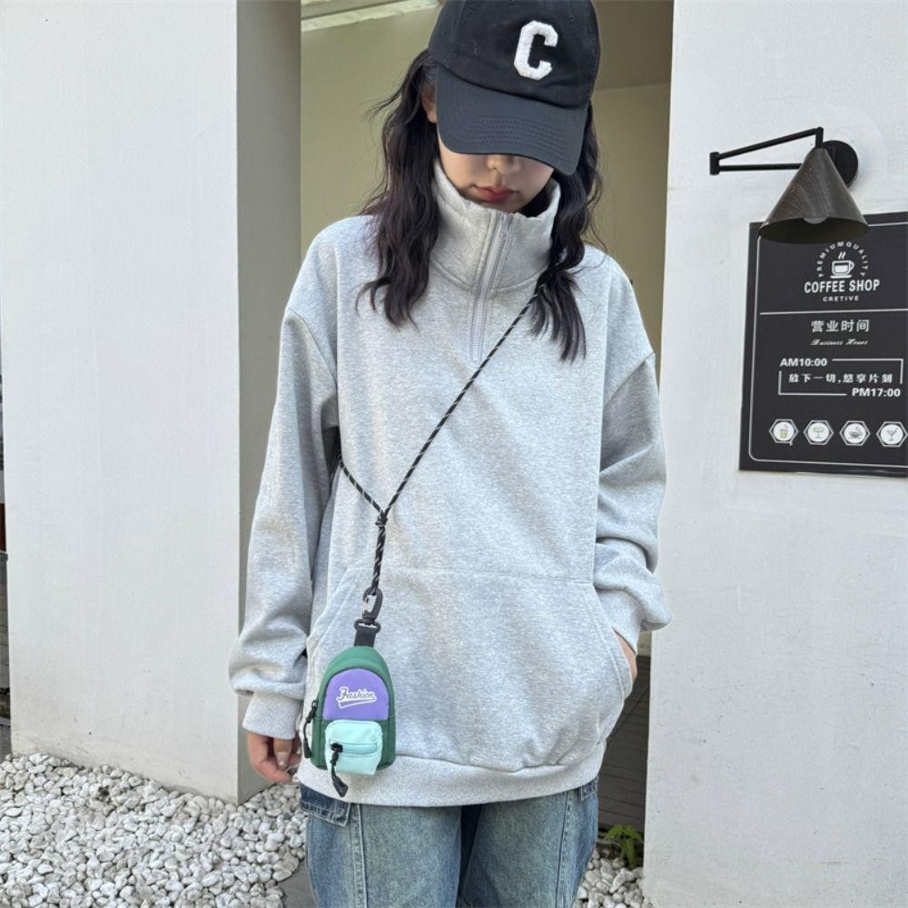 กระเป๋าใส่เหรียญแบบแขวนกระเป๋าสตางค์ขนาดเล็กกันขโมยโพลีเอสเตอร์กระเป๋าเก็บหูฟังขนาดเล็กสีตัดกันน่ารัก - รูปที่ 4