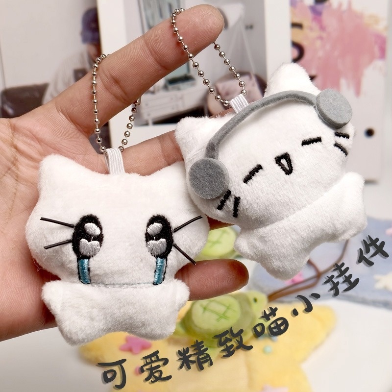 การ์ตูนน่ารักชุดหูฟังแมวโทรศัพท์โซ่จี้หูฟังตุ๊กตาคิตตี้ตุ๊กตาของเล่นกระเป๋าเสน่ห์กระเป๋านักเรียนตกแต่งของขวัญ