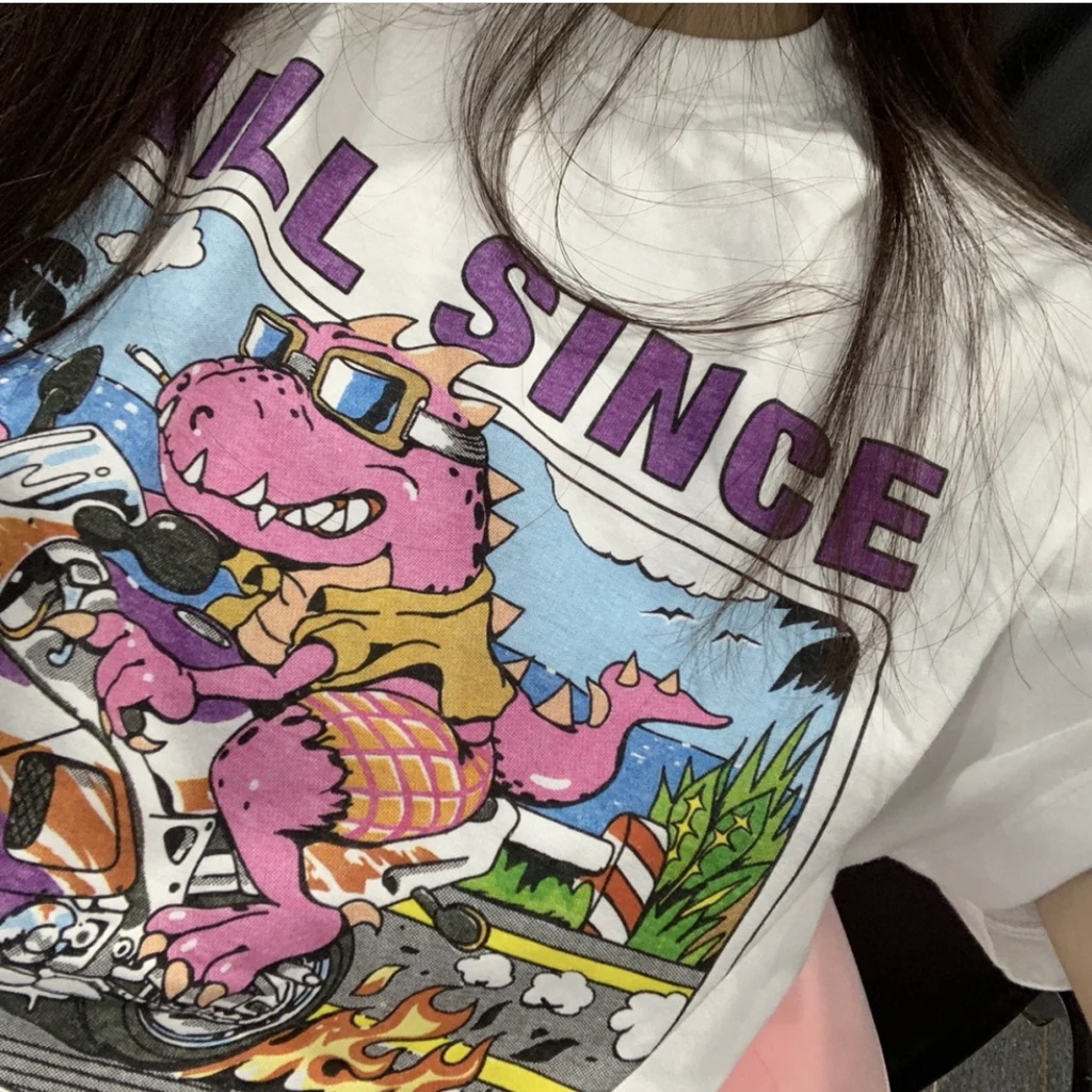 (จัดส่งตลอด 24 ชั่วโมง）Angel Official Hip Hop Streetwear Harajuku เสื้อยืด Retro ไดโนเสาร์พิมพ์เสื้อยืด