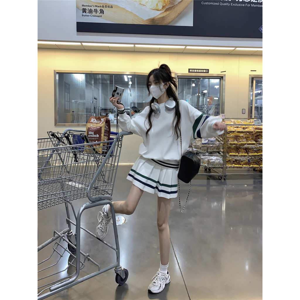 อเมริกันหวานสาวร้อนกระโหลกสไตล์เอวสูงย้อนยุคโปโลเสื้อกันหนาวอารมณ์กระโปรงจีบสองชิ้น