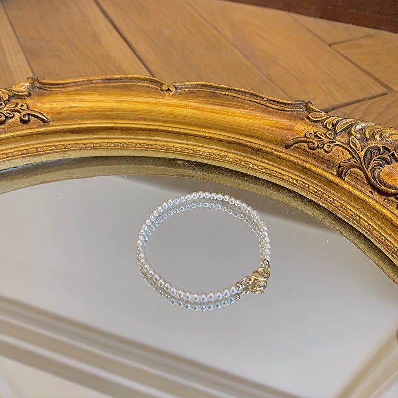 สร้อยข้อมือมุกสาวแสงหรูหราซอกการออกแบบระดับไฮเอนด์ความรู้สึกแฟนนักเรียนสร้อยข้อมือย้อนยุคลูกปัดสไตล์จีน