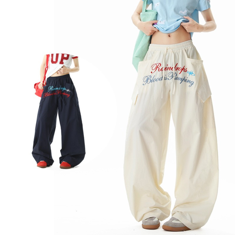 SUIKONE ซุยโคเนะ อเมริกันสไตล์ขี้เกียจจดหมายเย็บปักถักร้อยแห้งเร็วหลวมกางเกงลําลองขากว้างสําหรับผู้ชายและผู้หญิงในฤดูร้อน